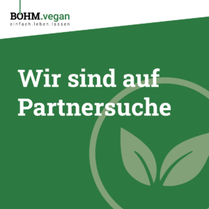 Text "wir sind auf Partnersuche" auf grünem Hintergrund