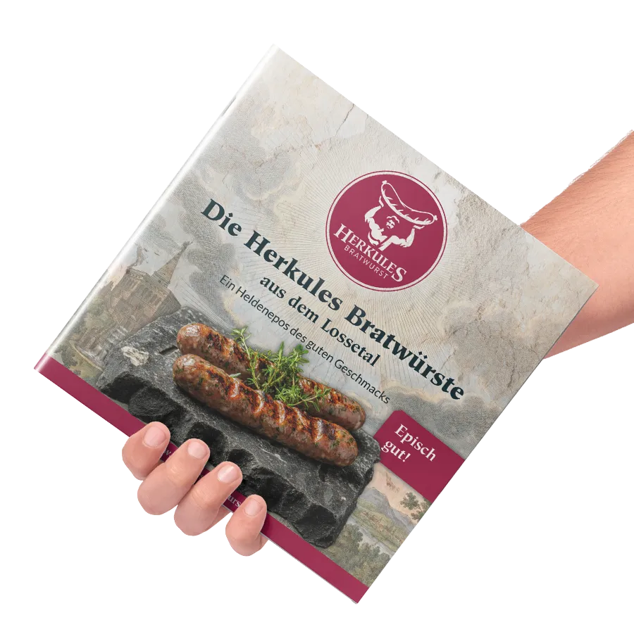 Eine Hand hält das Buch „Die Herkules Bratwürste aus dem Lossetal – Ein Heldenepos des guten Geschmacks“.